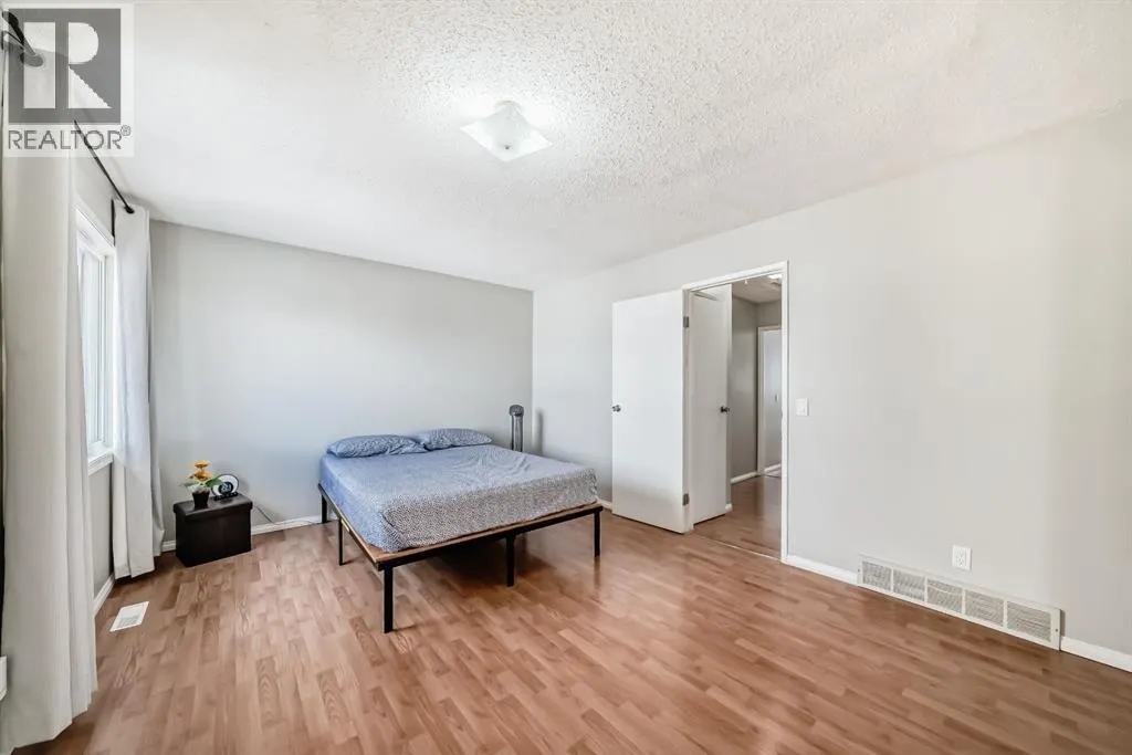 702, 9930 Bonaventure Drive SE