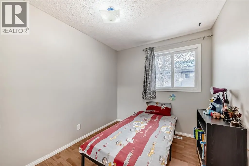 702, 9930 Bonaventure Drive SE