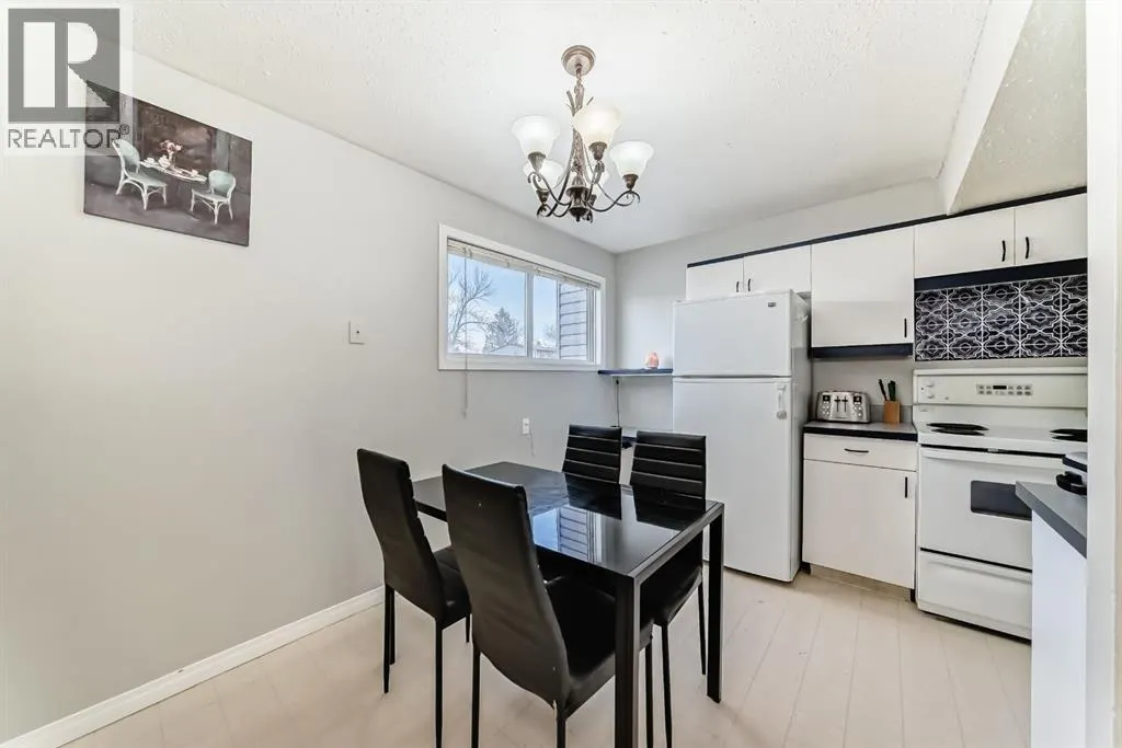 702, 9930 Bonaventure Drive SE