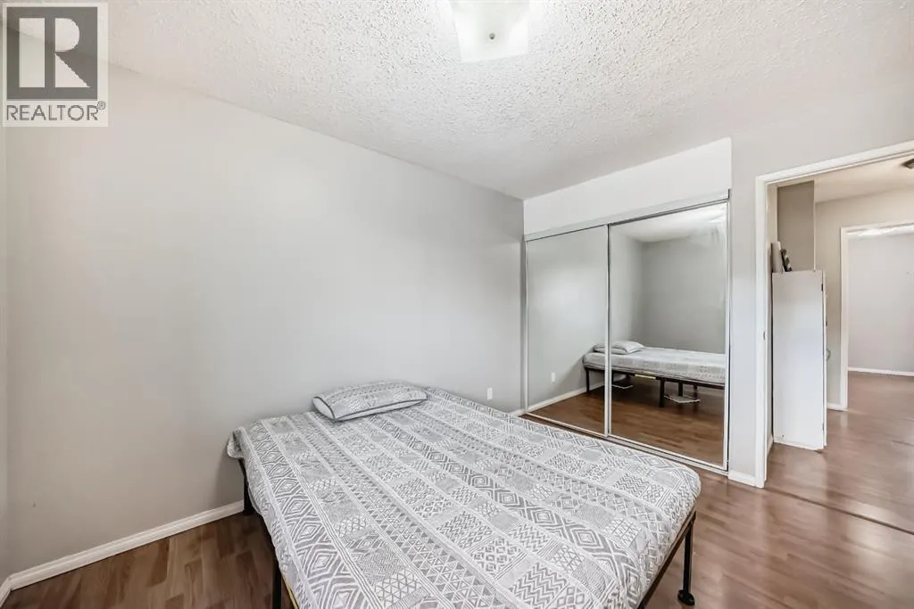 702, 9930 Bonaventure Drive SE