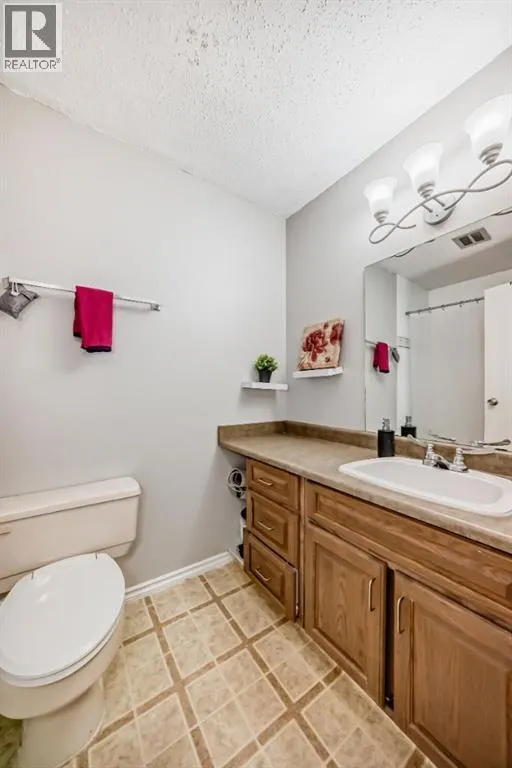 702, 9930 Bonaventure Drive SE