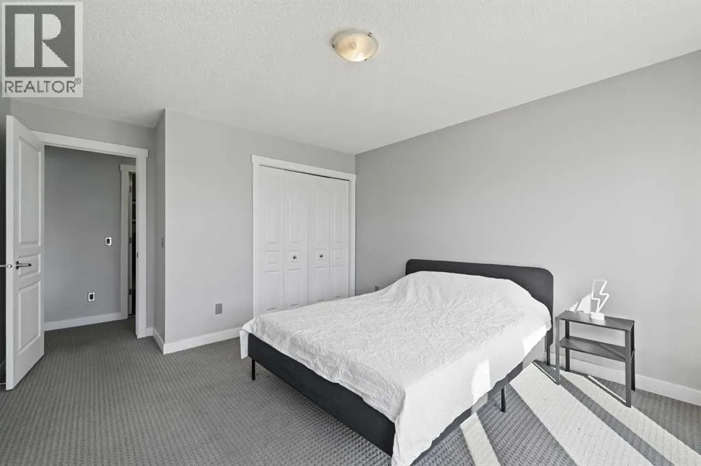 2205, 211 Aspen Stone Boulevard SW