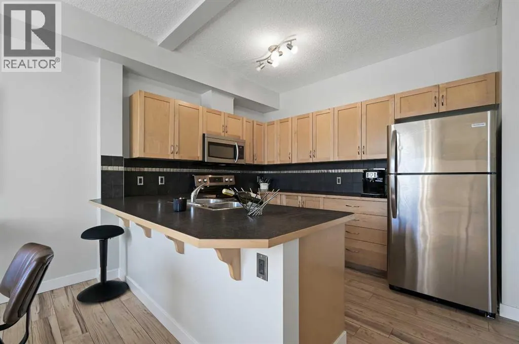 2205, 211 Aspen Stone Boulevard SW
