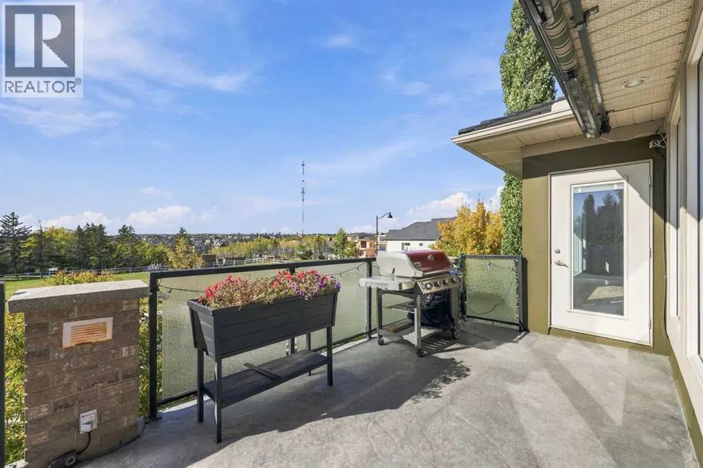 65 Aspen Ridge Crescent SW