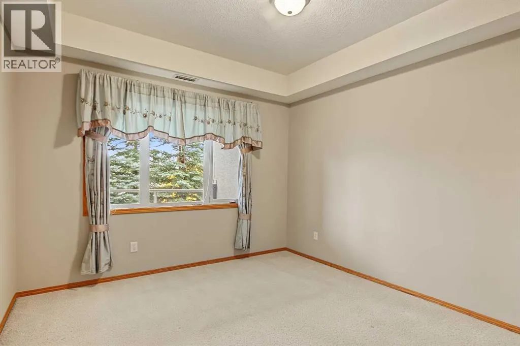 209, 15 Everstone Drive SW