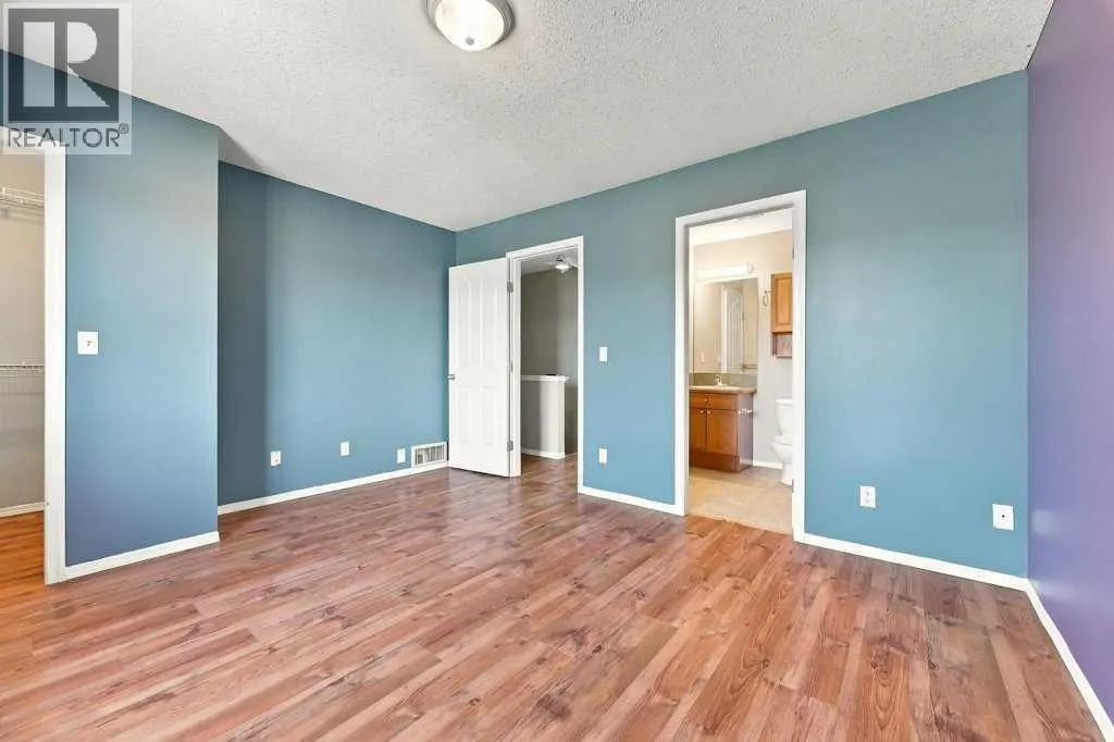 303, 2005 Luxstone Boulevard SW