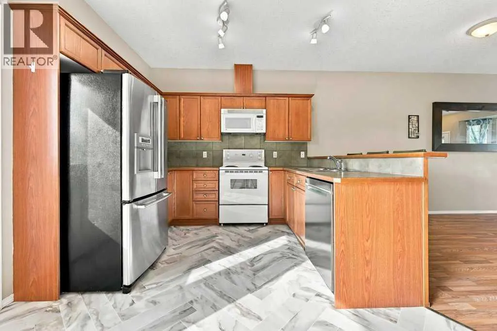 303, 2005 Luxstone Boulevard SW