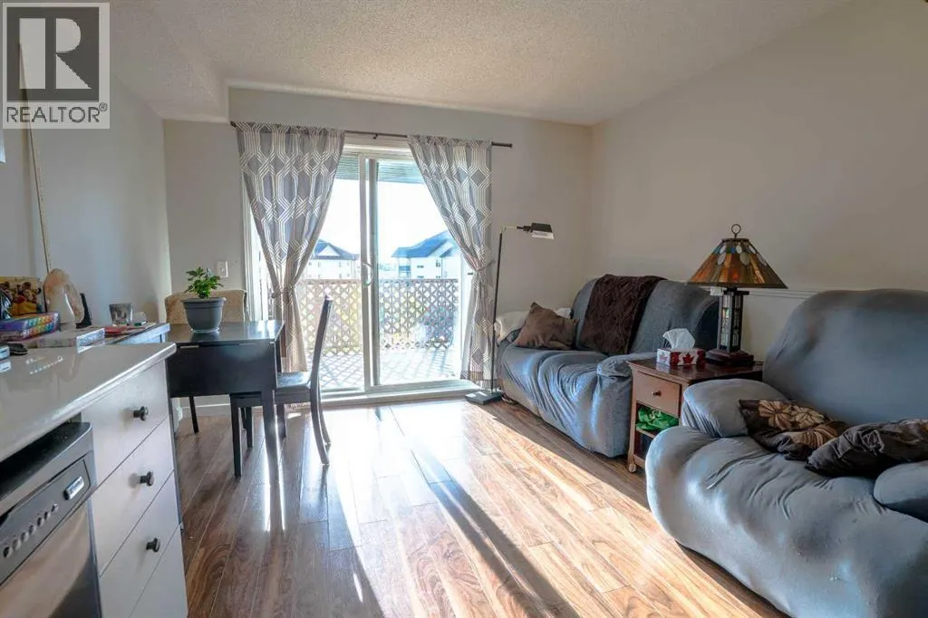 8412, 304 Mackenzie Way SW