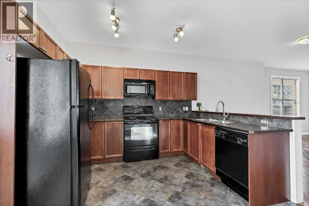 101, 703 Luxstone Square SW