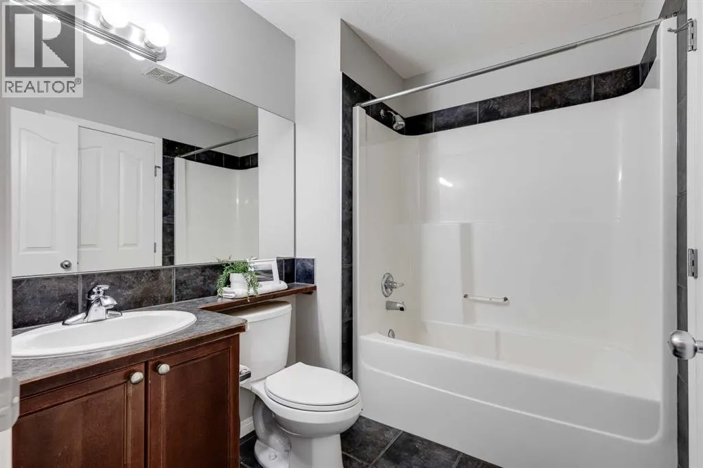 101, 703 Luxstone Square SW
