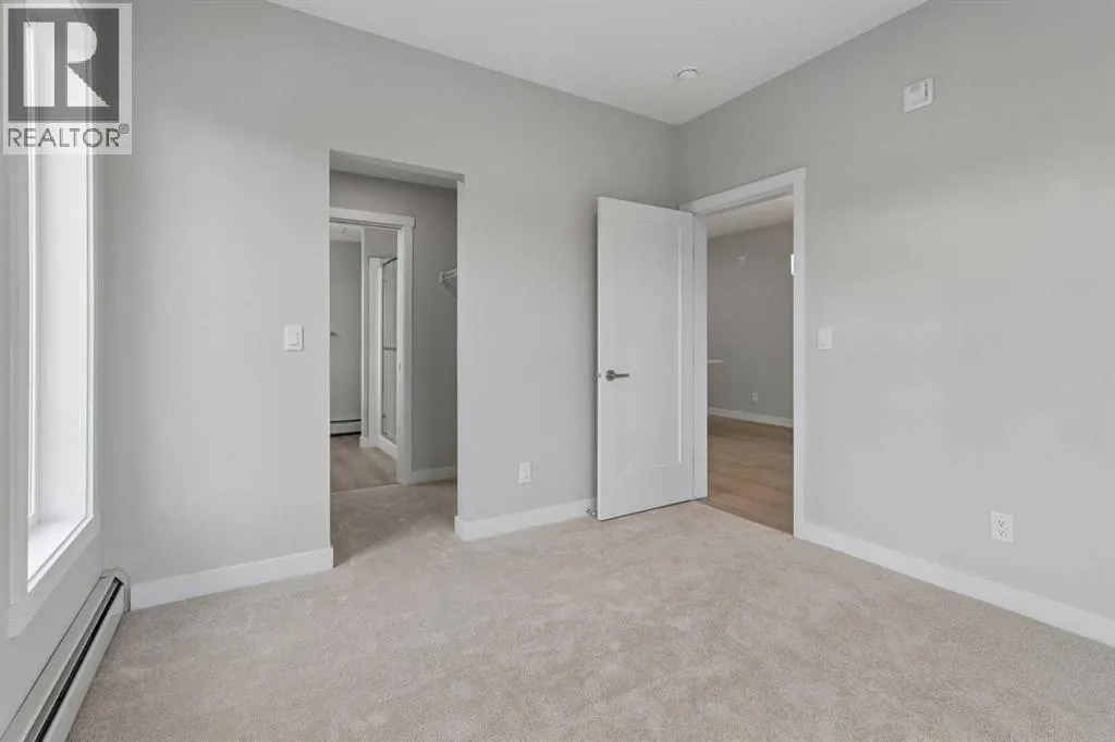 312, 655 Shawnee Square SW