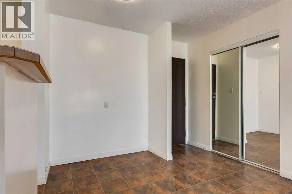 303, 715 15 Avenue SW
