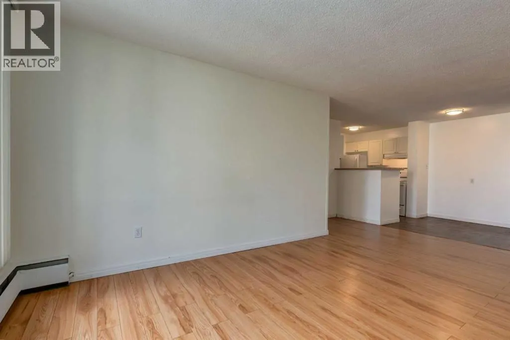 303, 715 15 Avenue SW