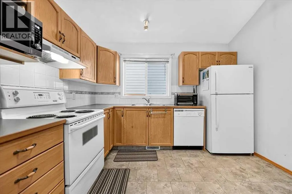 26 Saddlemead Way NE