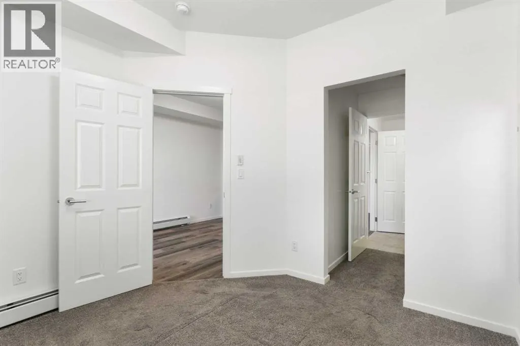 1206, 298 Sage Meadows Park NW