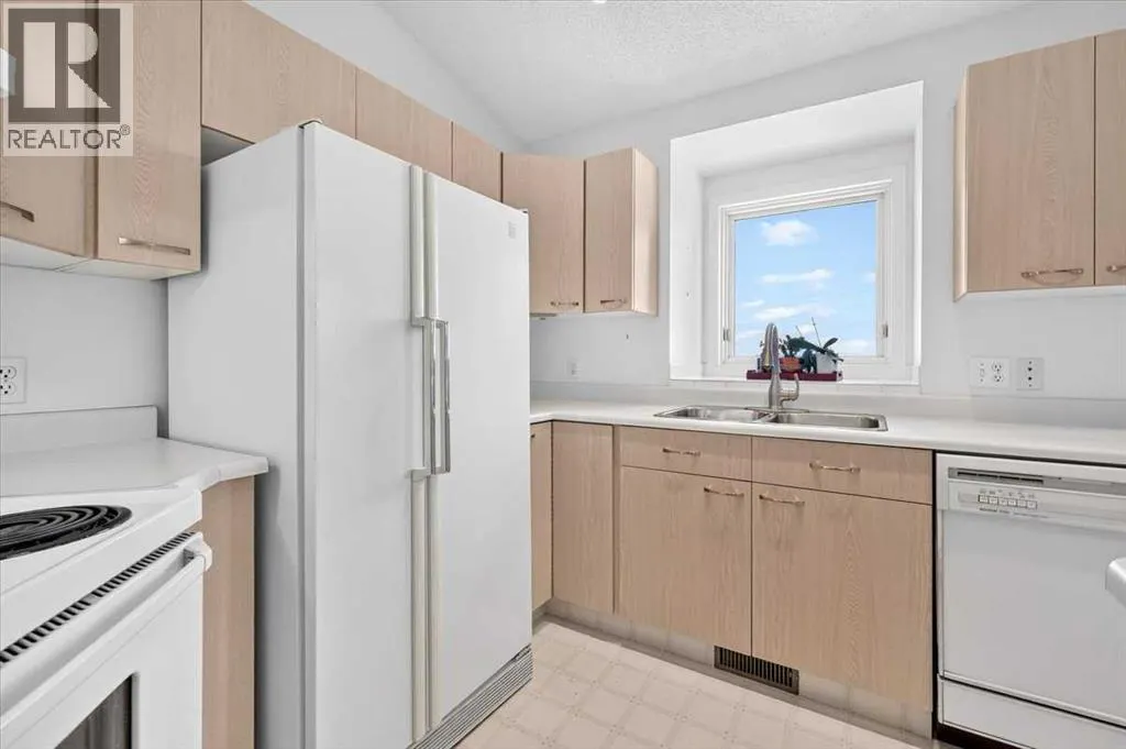 24, 5790 Patina Drive SW