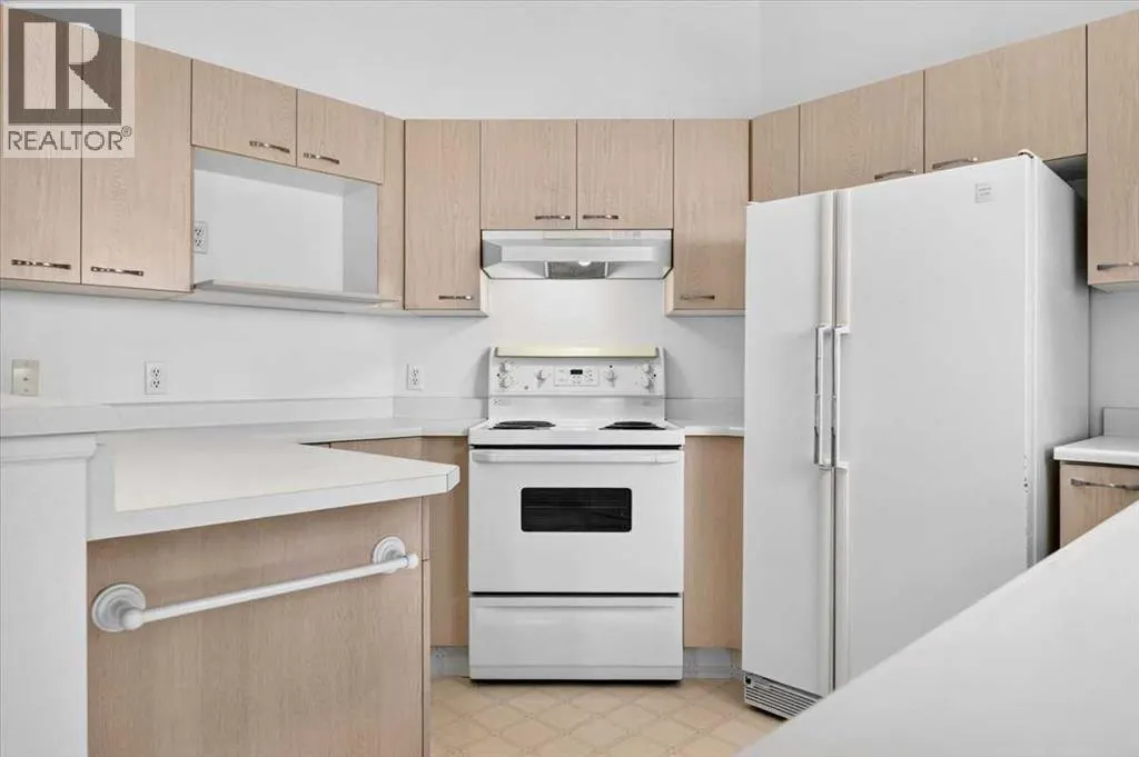 24, 5790 Patina Drive SW