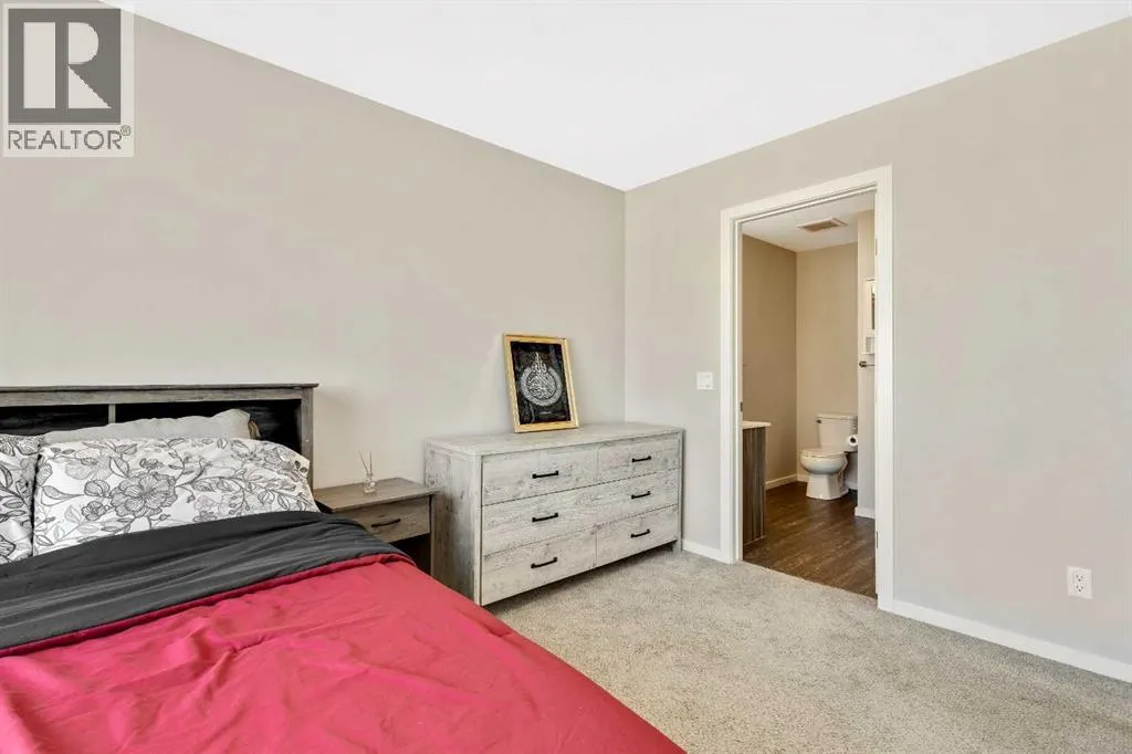 203, 245 Redstone Walk NE