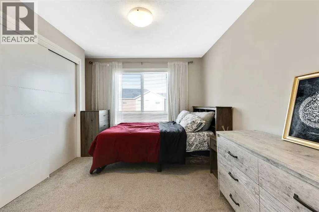 203, 245 Redstone Walk NE