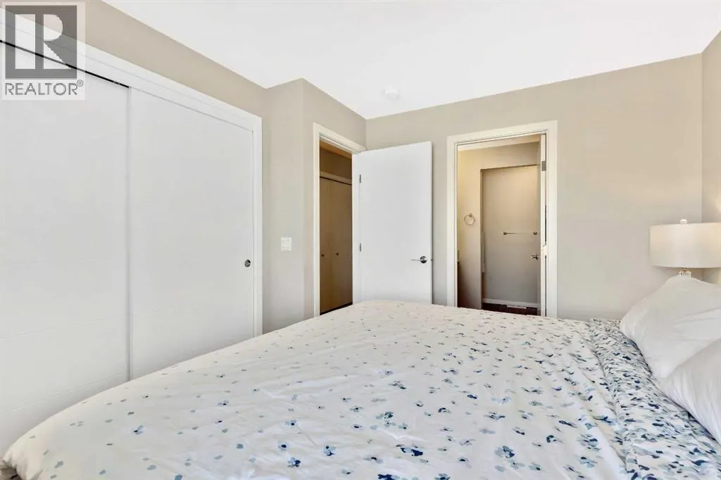 203, 245 Redstone Walk NE