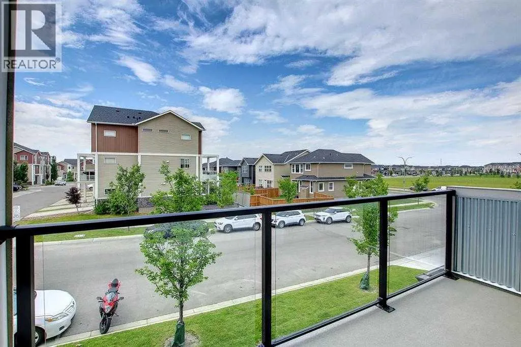 203, 245 Redstone Walk NE