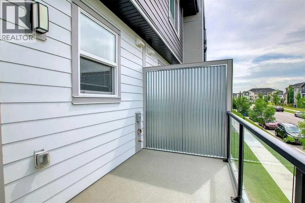 203, 245 Redstone Walk NE