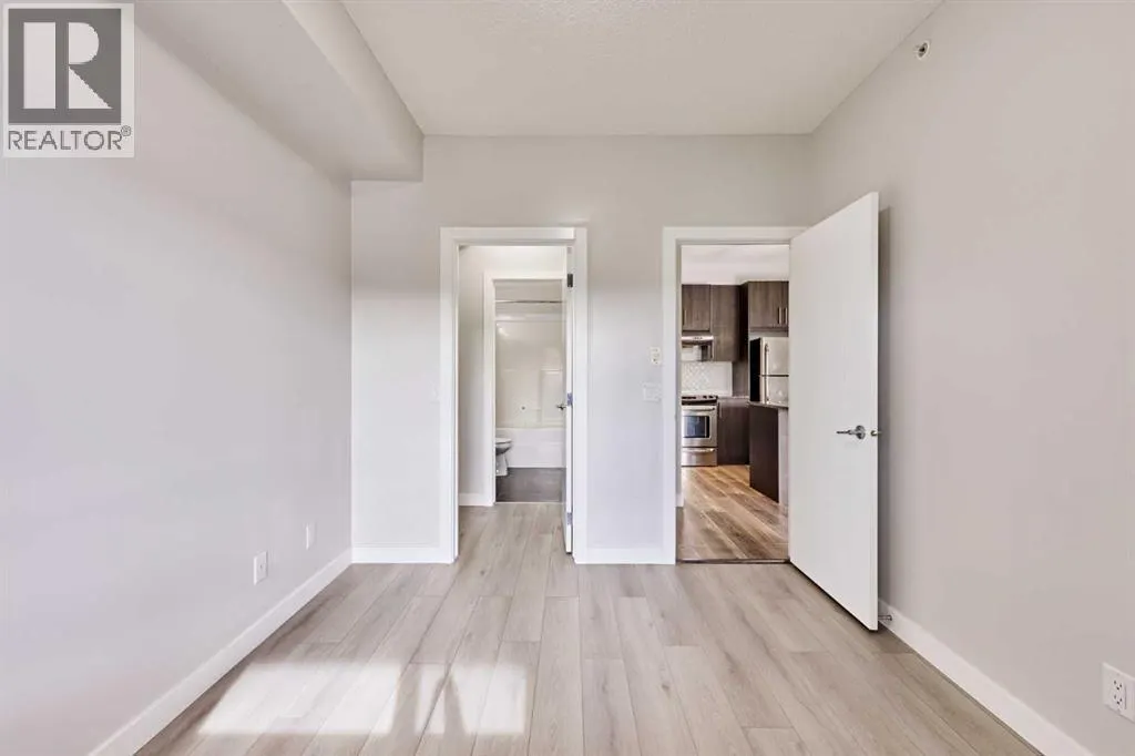 305, 12 Sage Hill Terrace NW