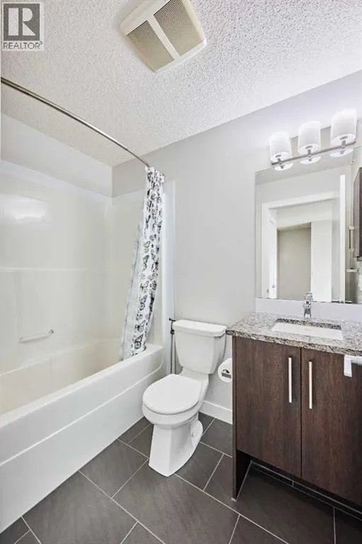 305, 12 Sage Hill Terrace NW