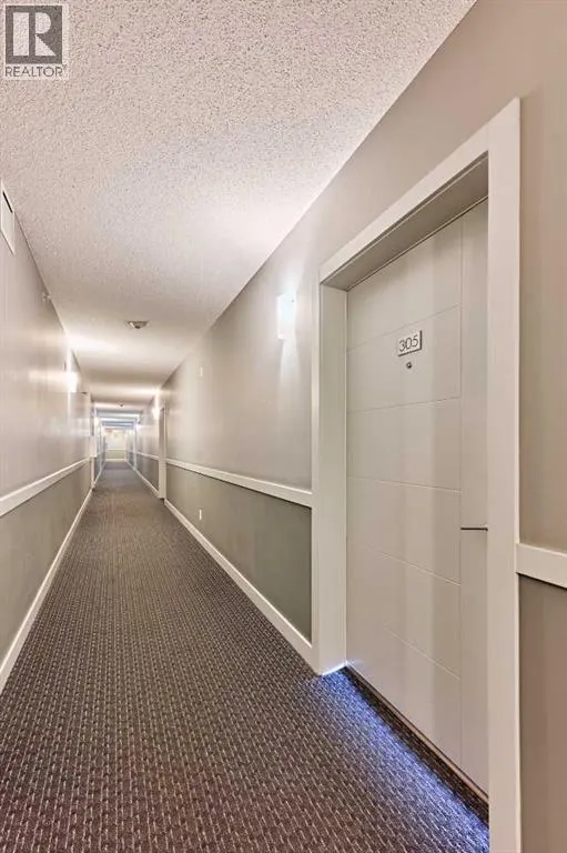 305, 12 Sage Hill Terrace NW