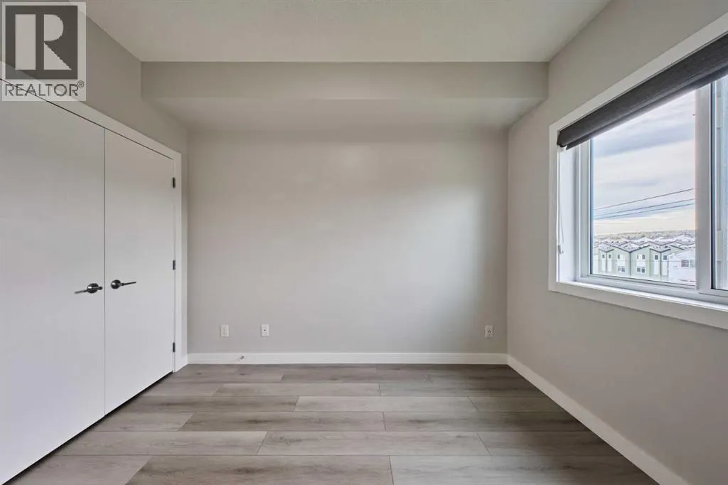 305, 12 Sage Hill Terrace NW