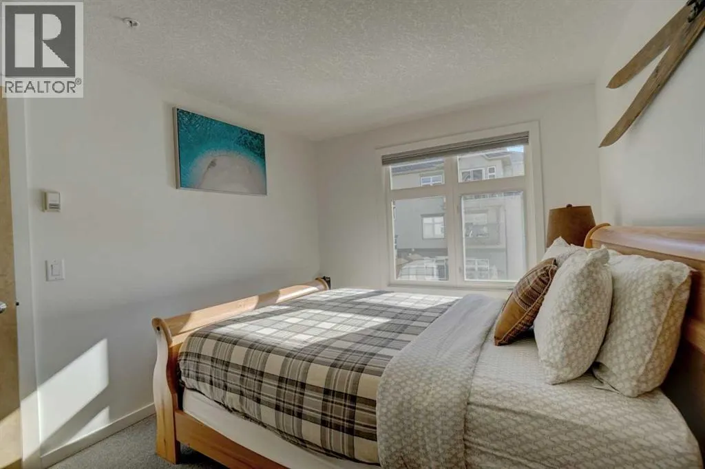 307, 160 Kananaskis Way