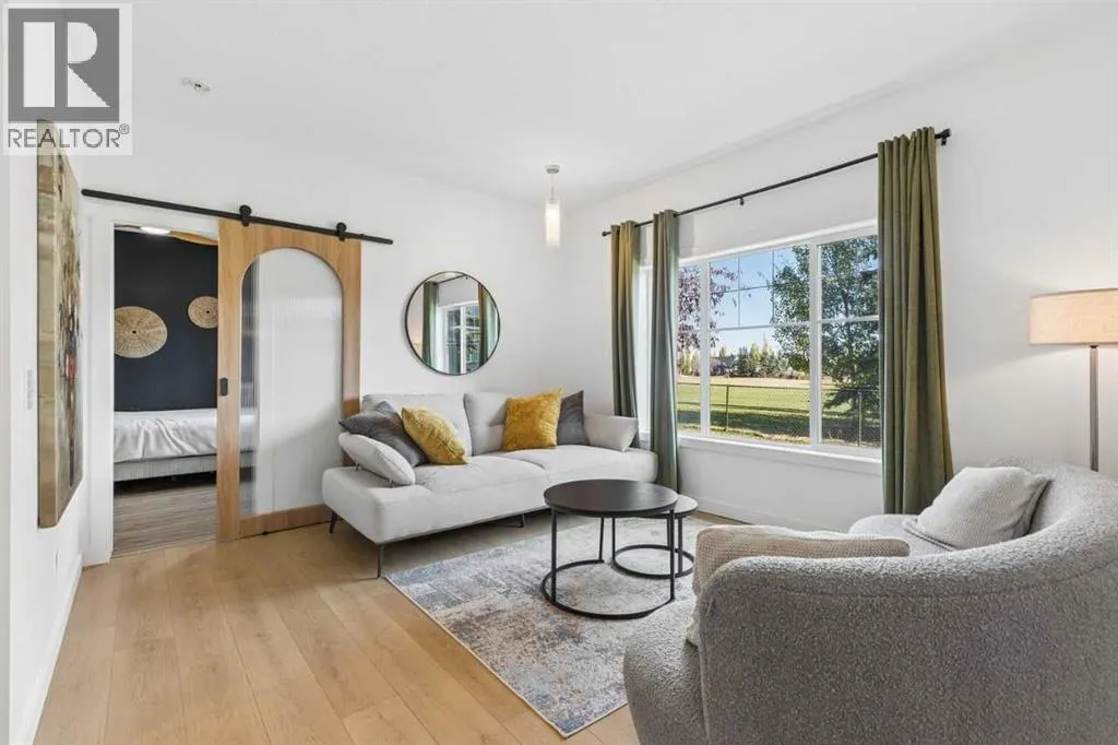 306, 281 Cougar Ridge Drive SW