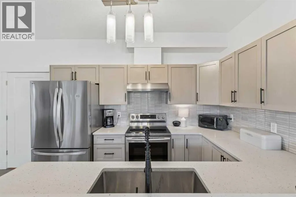 306, 281 Cougar Ridge Drive SW