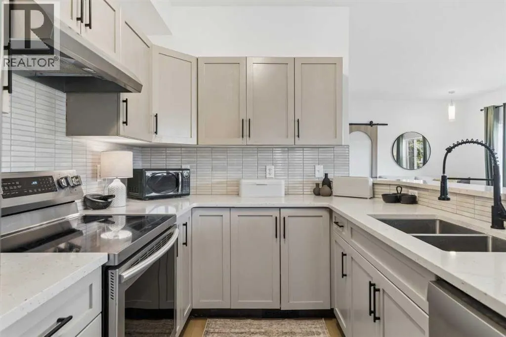 306, 281 Cougar Ridge Drive SW