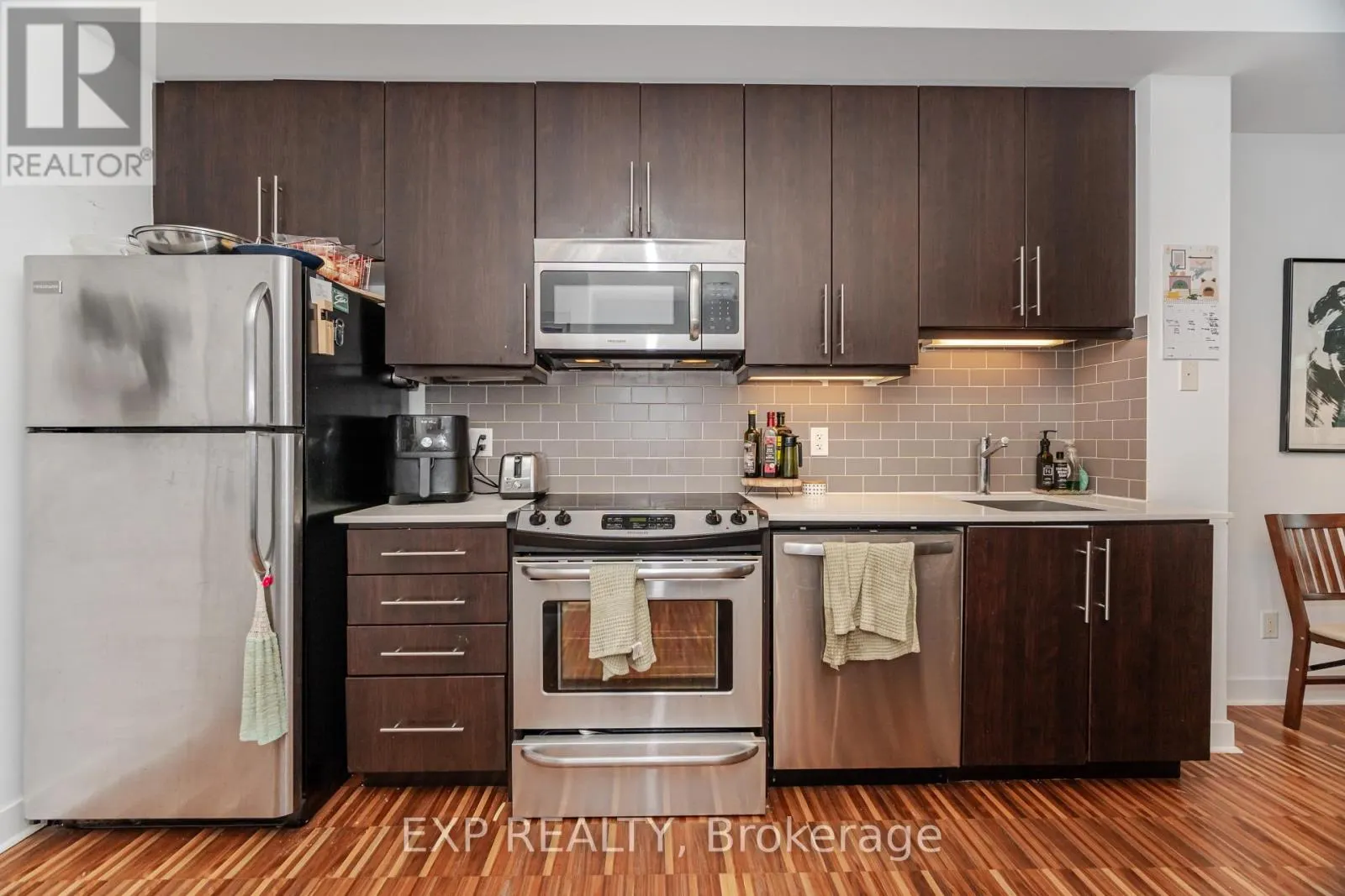 1005 - 1171 QUEEN STREET W
