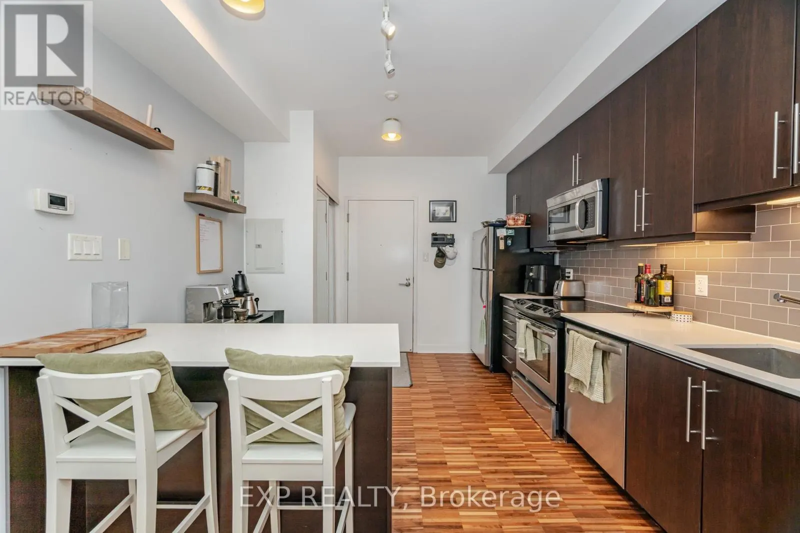 1005 - 1171 QUEEN STREET W