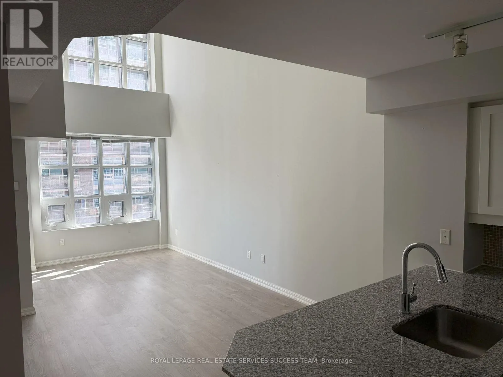 718 - 65 EAST LIBERTY STREET