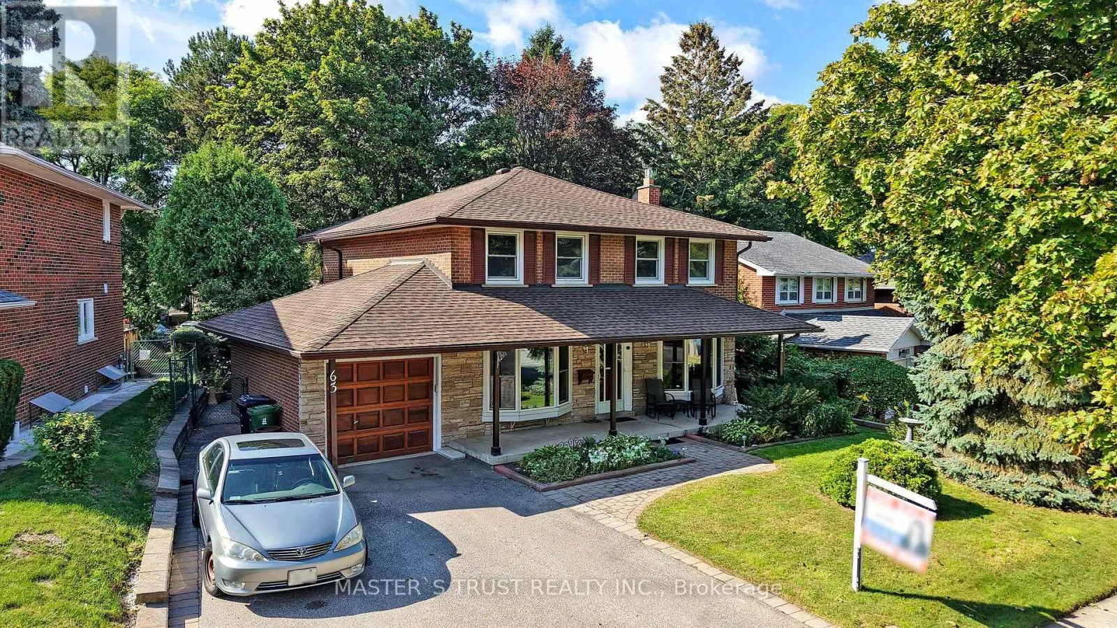63 MCNICOLL AVENUE