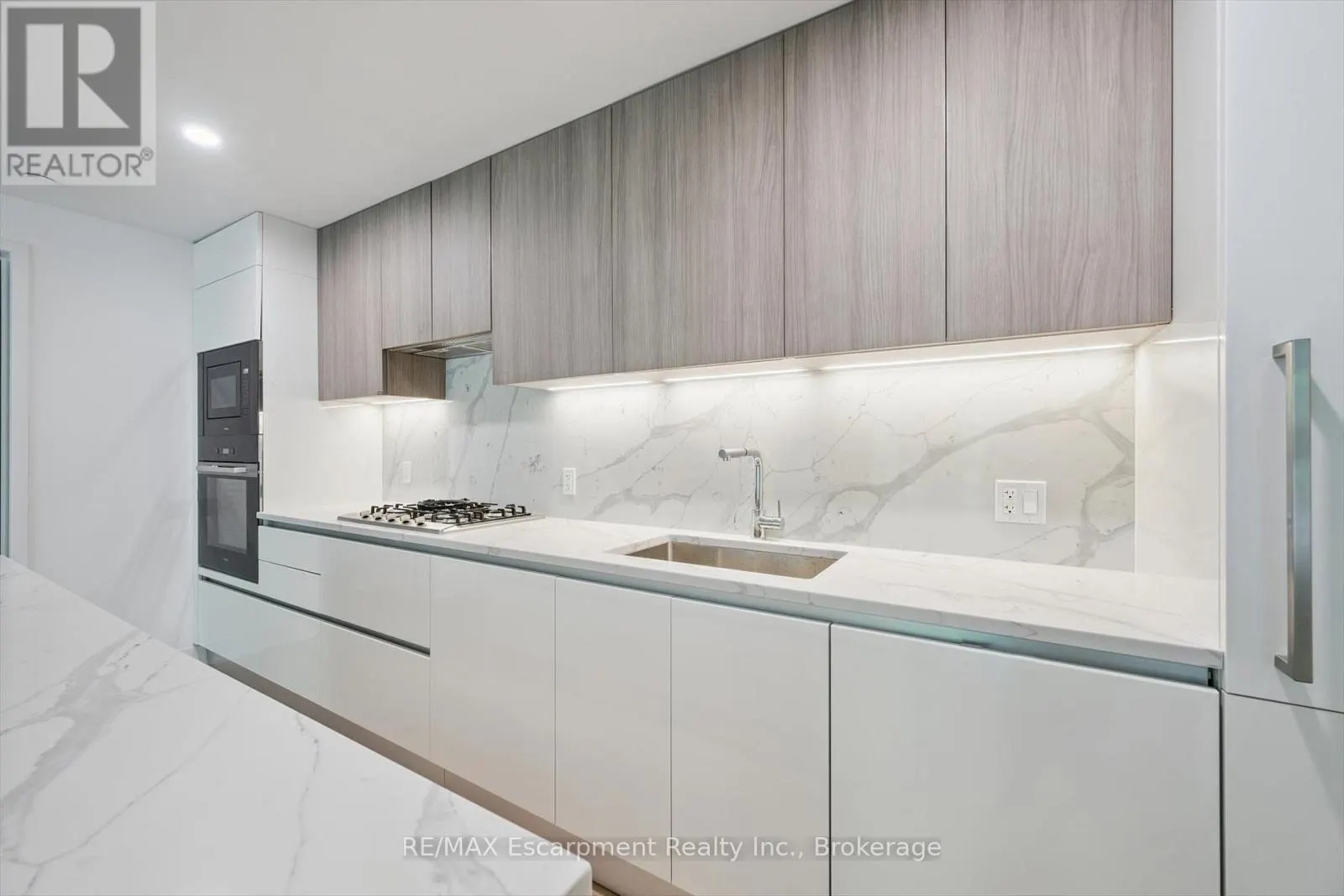 201 - 200 KEEWATIN AVENUE, #201