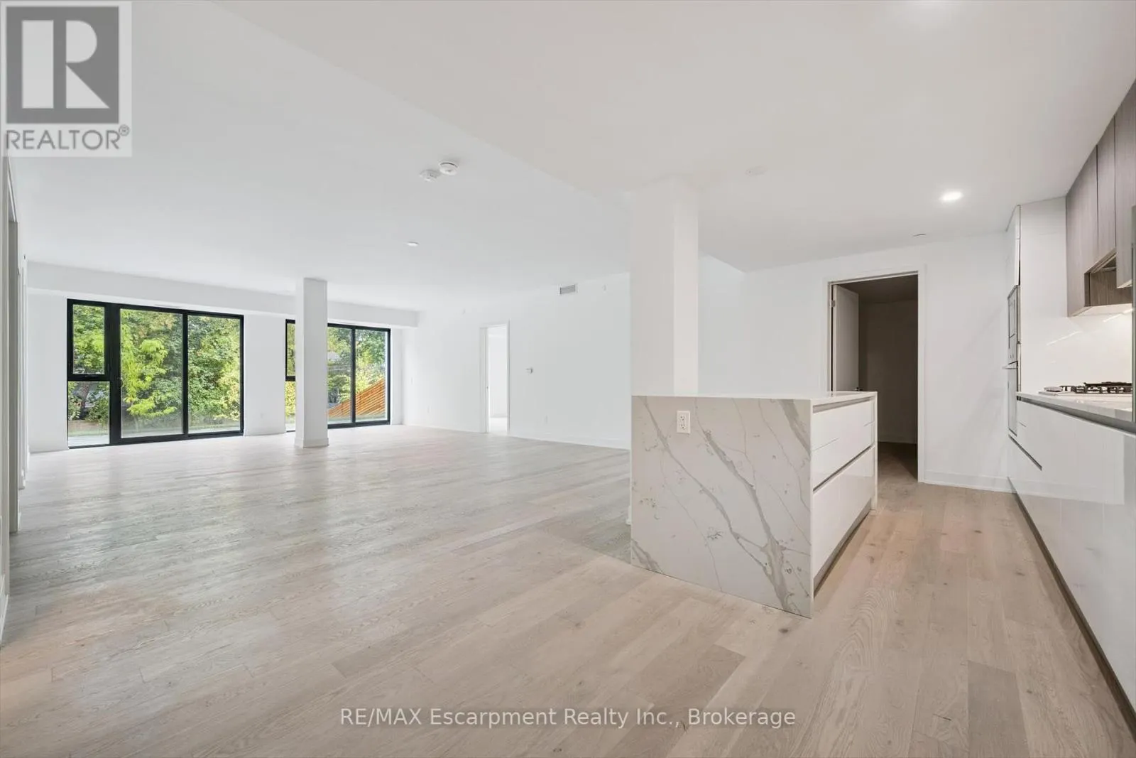 201 - 200 KEEWATIN AVENUE, #201
