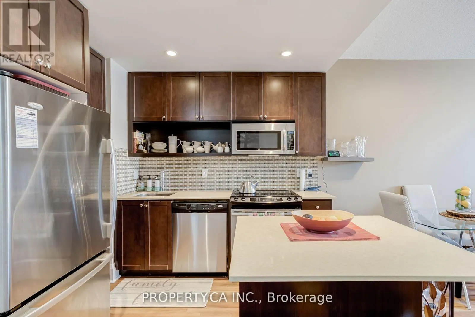 205 - 100 HARRISON GARDENS