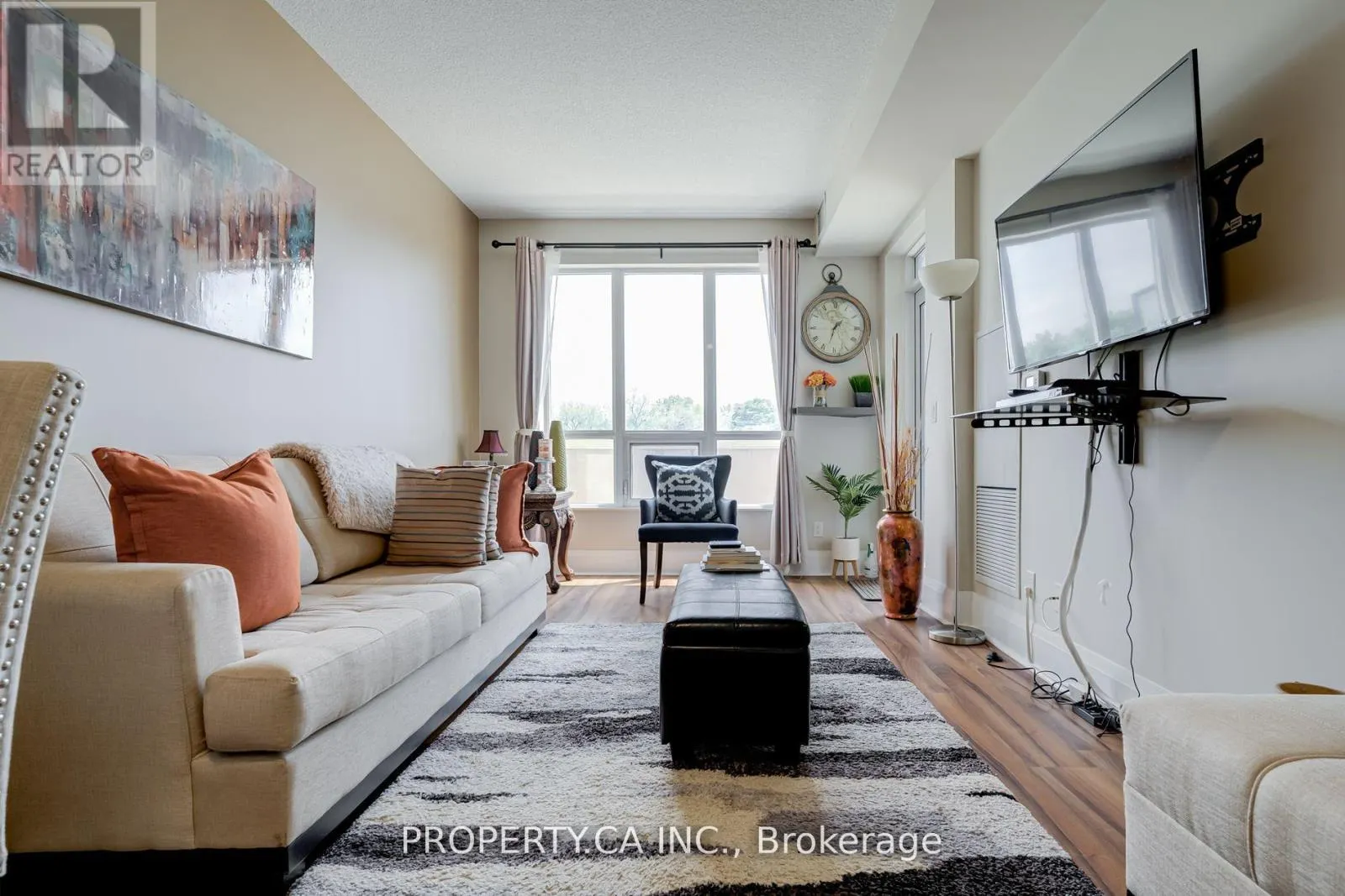 205 - 100 HARRISON GARDENS
