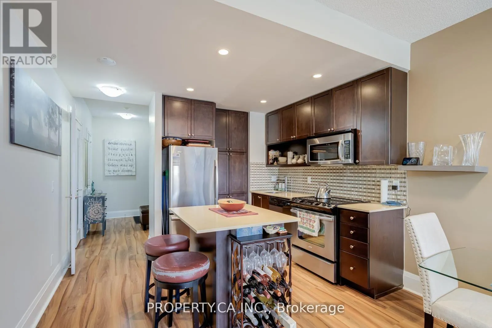 205 - 100 HARRISON GARDENS