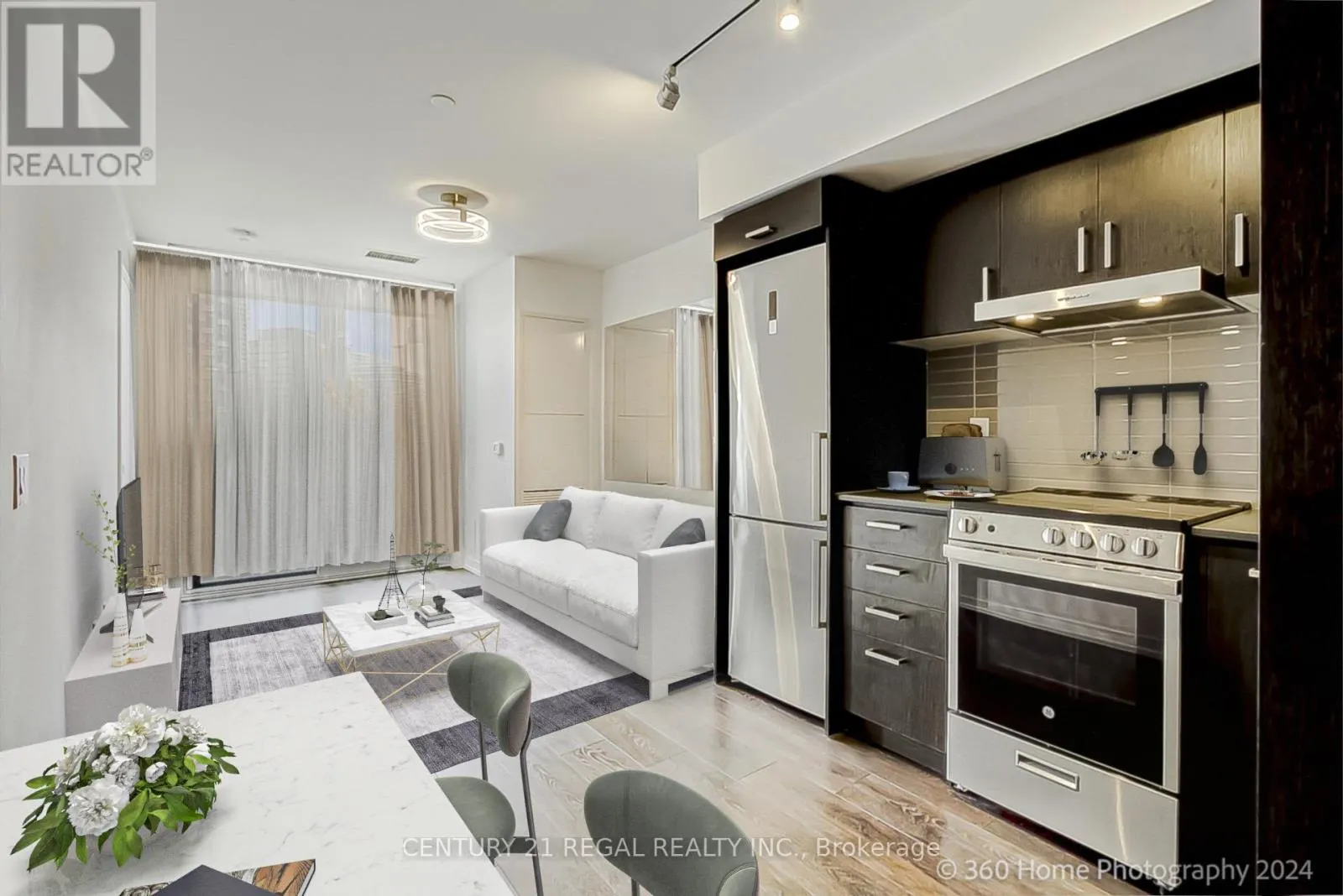 PH105 - 219 DUNDAS STREET E
