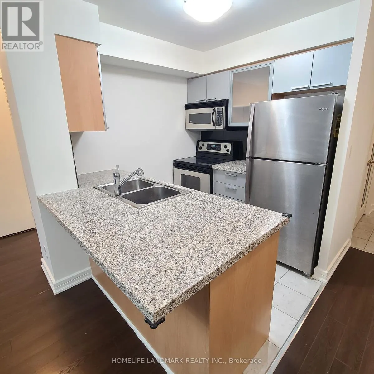 312 - 18 HARRISON GARDEN BOULEVARD