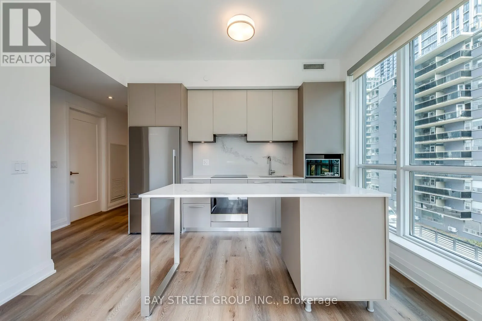 307 - 65 BROADWAY AVENUE