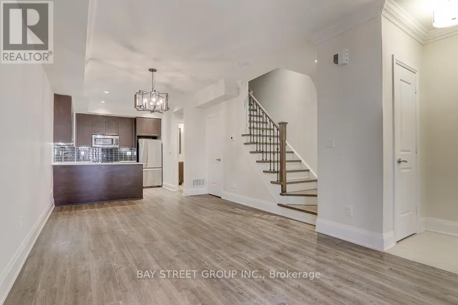 48 - 115 HARRISON GARDEN BOULEVARD