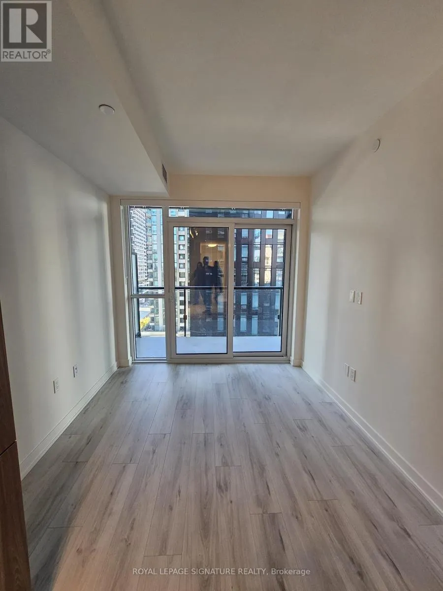 1004 - 110 BROADWAY AVENUE