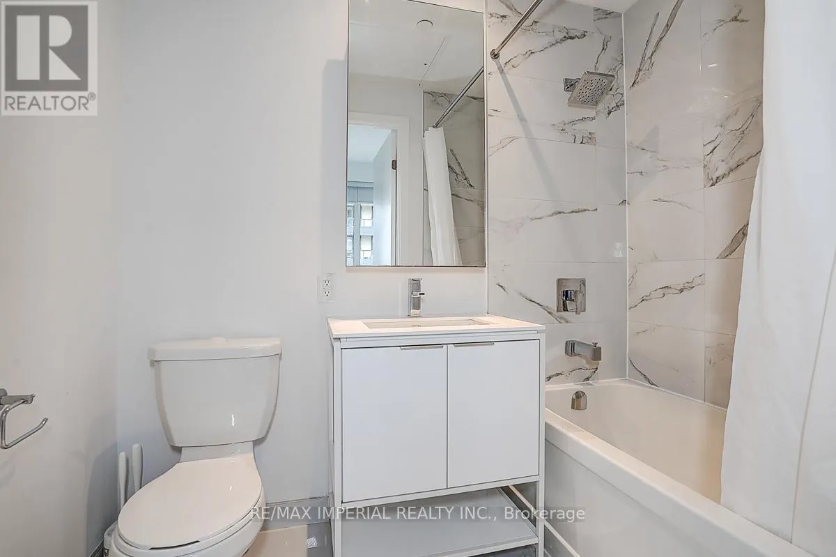 710 - 77 SHUTER STREET