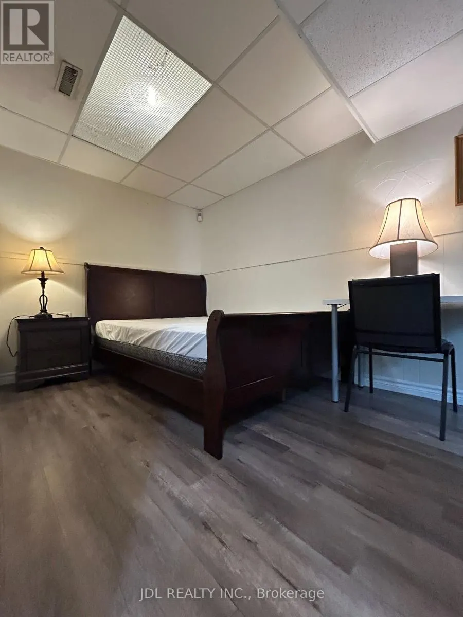 ONE MASTER BEDROOM BSMT - 3 BUTTERFIELD DR DRIVE